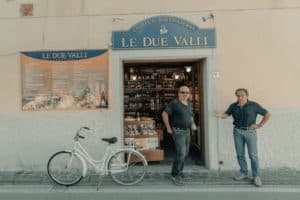 Italian men in front of Italian Business